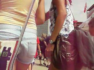 Following a girl in short jeans pants Picture 3