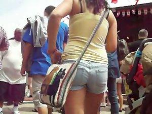 Following a girl in short jeans pants Picture 8