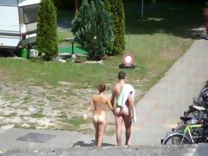 Nudist couple going to their camp Picture 3