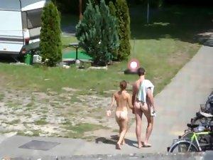 Nudist couple going to their camp Picture 4