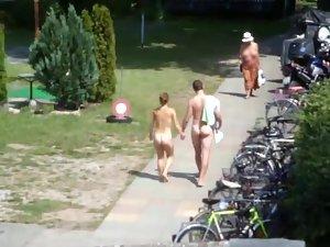 Nudist couple going to their camp Picture 7