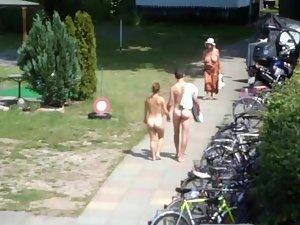 Nudist couple going to their camp Picture 8