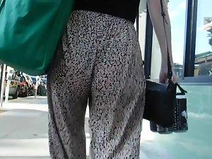 Tight butt cheeks shake in loose pants