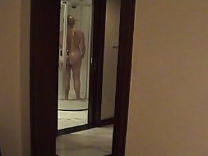 Milf filmed while under the shower