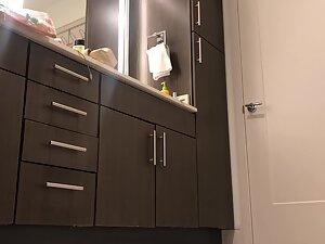 Spying on naked girl showering and washing her teeth Picture 2