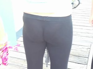Ideal young ass in tight black leggings