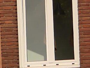 Glimpses of hot naked neighbor in window Picture 5