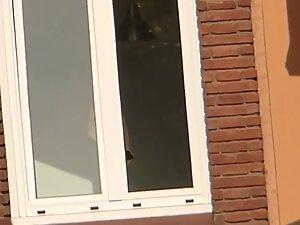 Glimpses of hot naked neighbor in window Picture 7