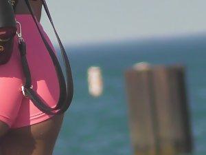 Exotic girl's cameltoe in pink shorts Picture 1