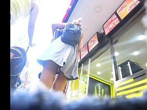 Upskirts of two girls that look like they are twins Picture 5