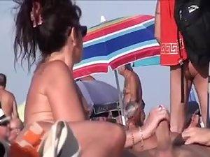 Blowjobs spied on a nudist beach Picture 6