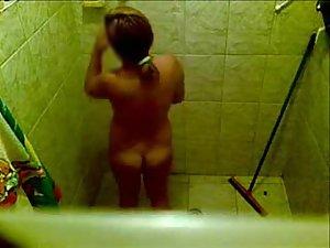 Sexy woman spied naked under a shower Picture 2