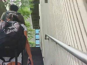 Quick view of tight little ass behind a big backpack Picture 1