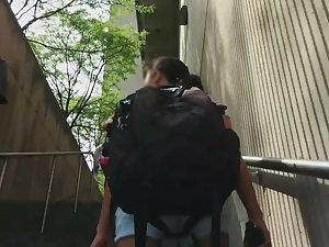 Quick view of tight little ass behind a big backpack Picture 4