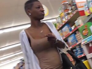 Busty black tomboy woman caught in supermarket
