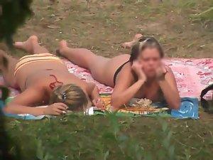 Chubby girls spied smoking and tanning Picture 3