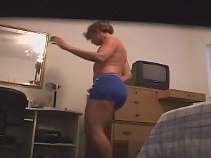 Dancing woman gets dressed Picture 5