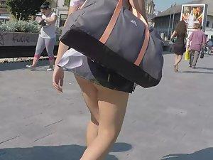 Summer breeze reveals ass cheeks Picture 1