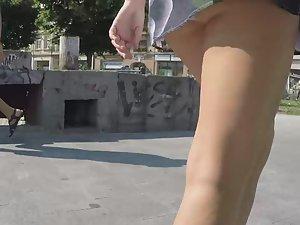 Summer breeze reveals ass cheeks Picture 3