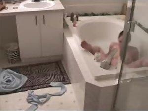 Hidden cam caught her horny in a bath Picture 4