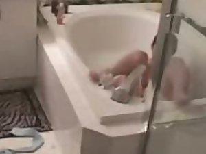 Hidden cam caught her horny in a bath