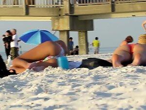 Beach voyeur zooms on smooth skin of her bikini area Picture 5