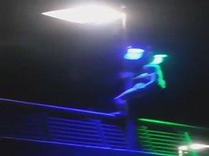 Slutty girl dances up on a bridge Picture 7