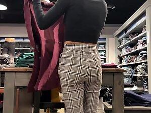 Checking out store clerk's ass while she folds clothes Picture 4