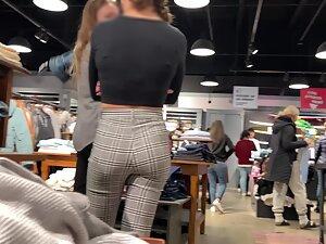 Checking out store clerk's ass while she folds clothes Picture 6