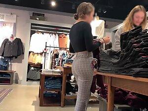 Checking out store clerk's ass while she folds clothes Picture 7