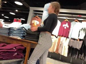 Checking out store clerk's ass while she folds clothes Picture 8