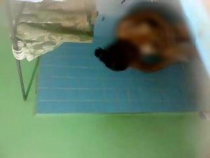 Spying on dark skinned lady showering Picture 3