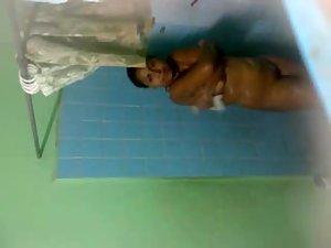 Spying on dark skinned lady showering Picture 4