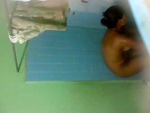 Spying on dark skinned lady showering Picture 6