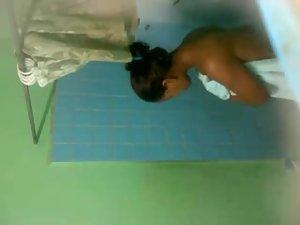 Spying on dark skinned lady showering Picture 8