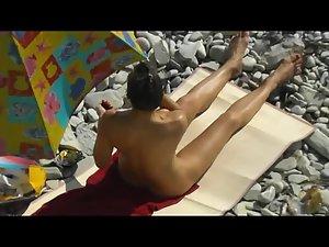 Smooth woman enjoys sunbathing Picture 7