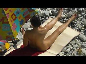 Smooth woman enjoys sunbathing Picture 8