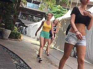 Energetic girl's tits pointing through her yellow top Picture 1