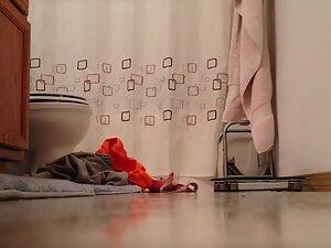 Waiting to see naked sister from under bathroom door Picture 1
