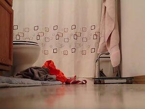 Waiting to see naked sister from under bathroom door Picture 2