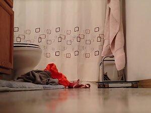 Waiting to see naked sister from under bathroom door Picture 4