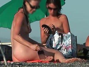 Two hot women spied on a beach Picture 3