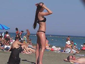 Incredible beach girl in a sexy bikini Picture 8