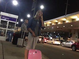 Hot girl landed and waits in front of airport Picture 8