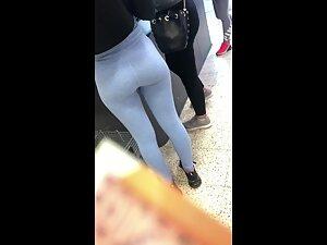 Risky peep on hot girl's grey leggings Picture 4