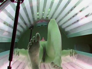 Skinny brunette peeped in a tanning bed Picture 8