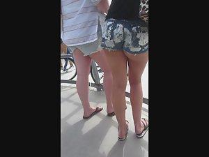 One half of naked butt cheek in booty shorts Picture 6