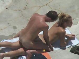 Oil rub leads to hot beach sex