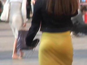 Black thong visible through sexy yellow skirt Picture 4