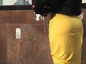 Black thong visible through sexy yellow skirt Picture 8